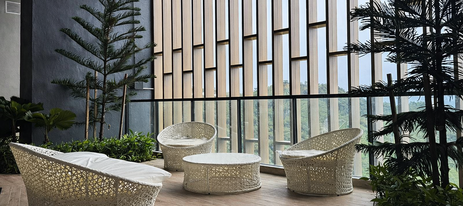 Sunlit garden lounge overlooking the mountains